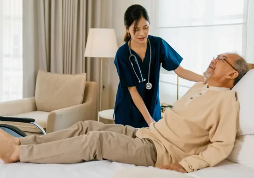 nurse-assisting-patient-postoperative-care-at-home (1)